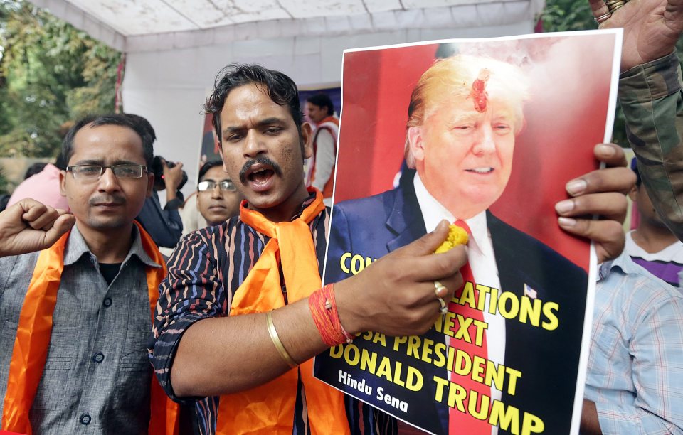  Some brandished posters of Trump with religious mark on his forehead