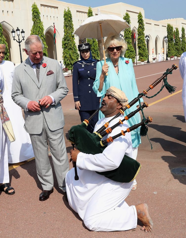 The royal couple were serenaded by a bagpipe player on their visit to the Middle Eastern country