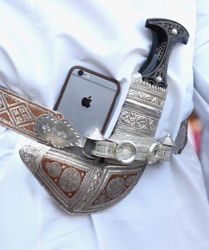 One of the dancers had an iPhone tucked into his belt along side his ceremonial knife