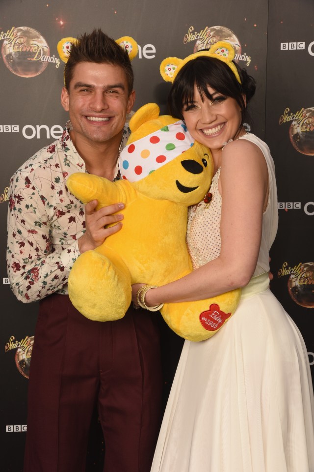  Daisy and her dancer partner Aljaz give Pudsey a hug