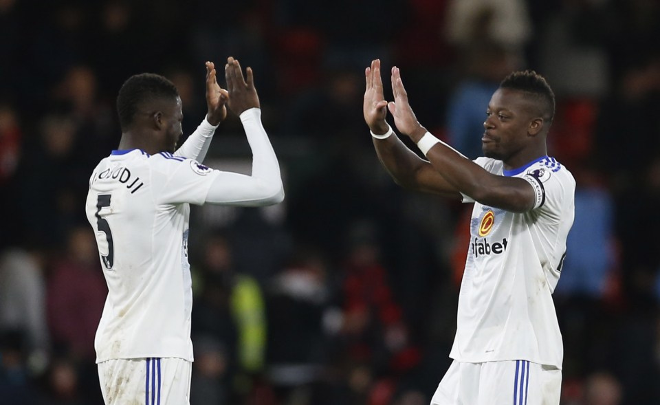 Sunderland's Papy Djilobodji and Lamine Kone celebrate the clubs first win of the season at Bournemouth