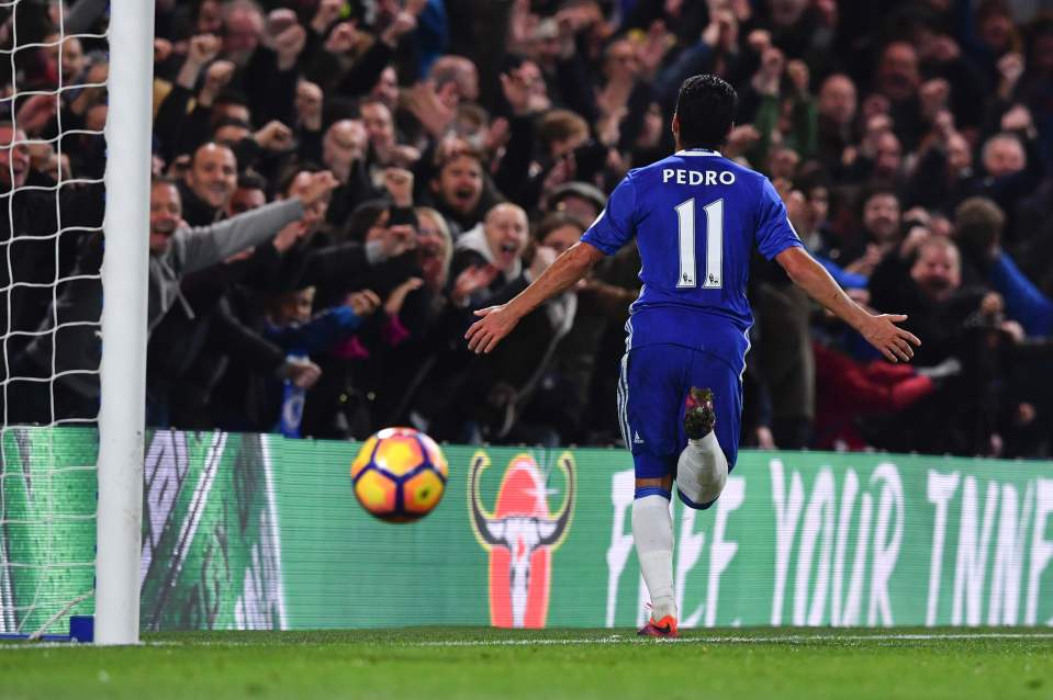 Chelsea's Spanish midfielder Pedro celebrates after scoring their fifth goal during the English Premier League football match between Chelsea and Everton at Stamford Bridge in London on November 5, 2016. / AFP PHOTO / Ben STANSALL / RESTRICTED TO EDITORIAL USE. No use with unauthorized audio, video, data, fixture lists, club/league logos or 'live' services. Online in-match use limited to 75 images, no video emulation. No use in betting, games or single club/league/player publications. / BEN STANSALL/AFP/Getty Images