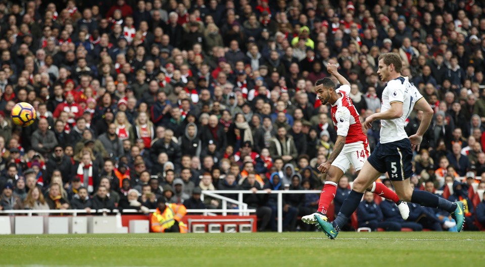 Arsenal forward Theo Walcott was denied by the upright against Tottenham on Sunday