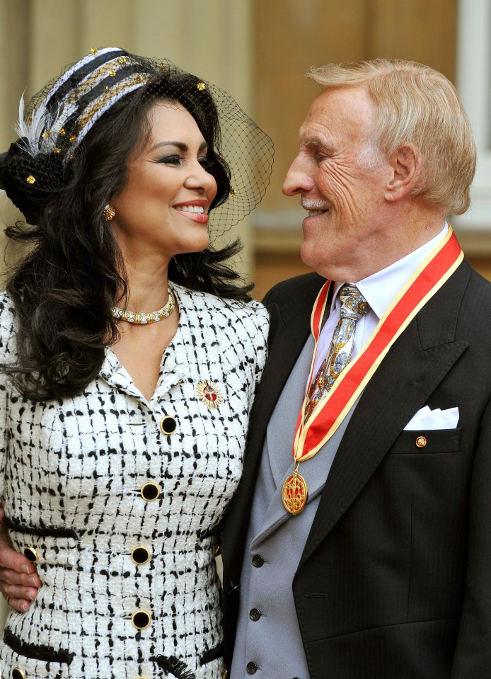 Sir Bruce Forsyth and his wife Wilnelia after he was knighted by Queen