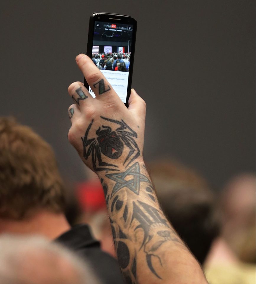  A Trump supporter sports some serious ink in Sioux City, Iowa