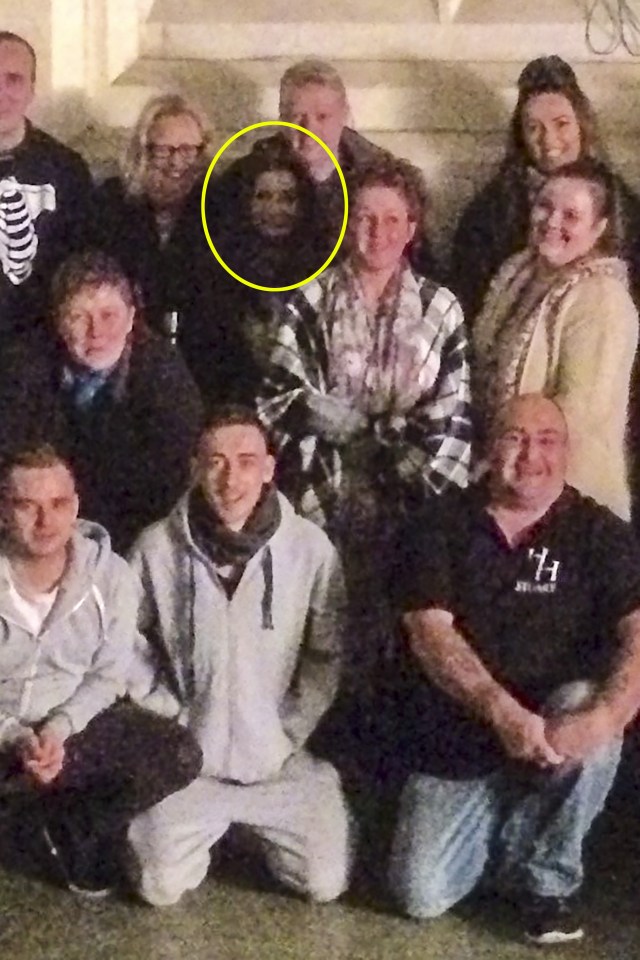 GHOST HUNTER CAPTURES PHOTOBOMBING PHANTOM ON CAMERA DURING TEAM PHOTO LINE-UP AT SPOOKY ABANDONED HOSPITAL