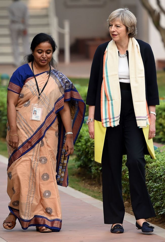  A mile in May shoes . . . the prime minister walking around the palace in comfy slip-ons