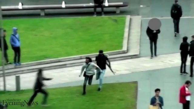  Ahmed is then shown to be chased by police in Piccadilly Gardens in Manchester