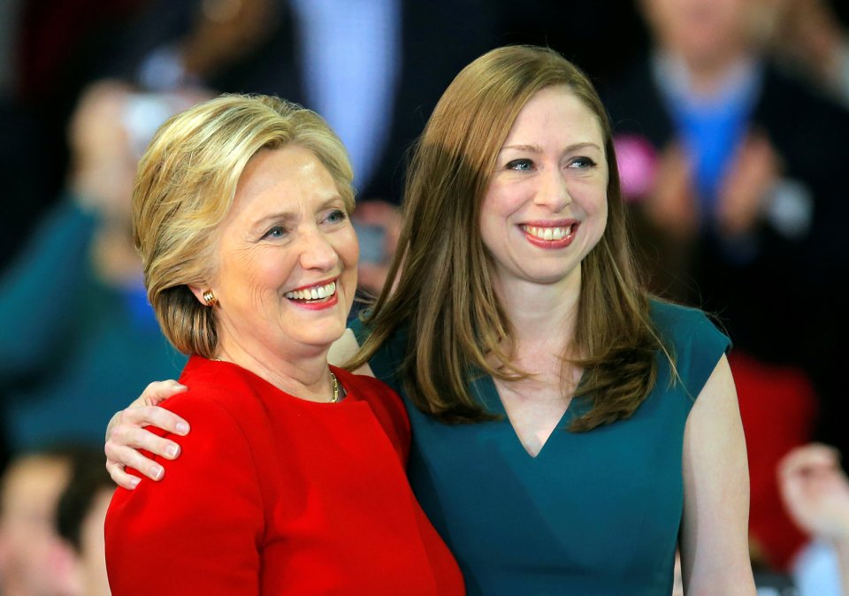  Democratic presidential nominee Hillary Clinton shares a hug with her daughter Chelsea Clinton at a campaign rally in Raleigh, North Carolina November 8