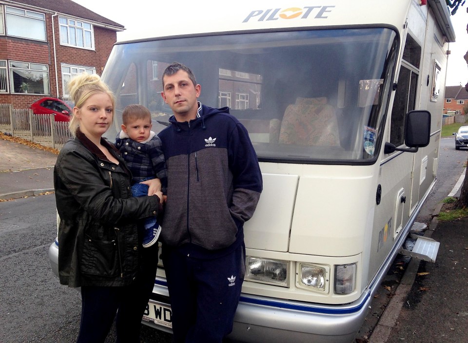  Family next to the second-hand campervan they bought from OAP