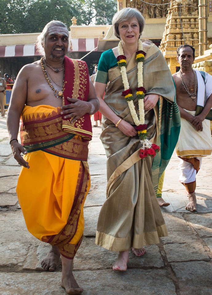  Theresa May visited the Sri Someshwara Hindu temple in Bangalore on the final day of a three-day trade mission designed to pave the way for close commercial links with India after Brexit