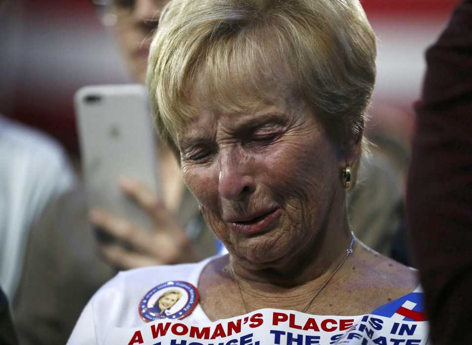  Clinton supporter looks distressed as further results come in