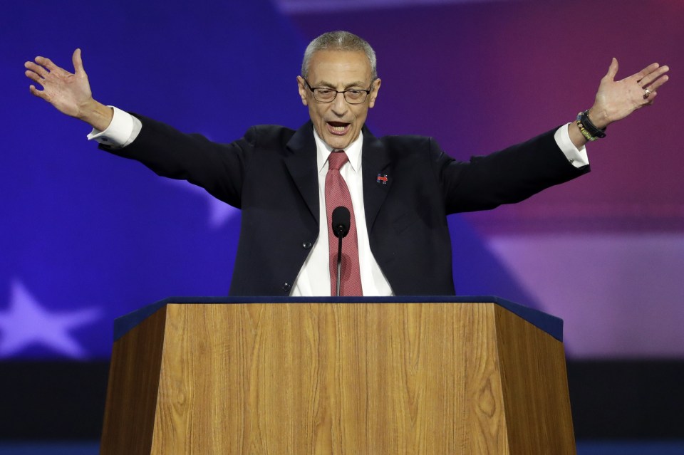  Clinton's campaign chairman John Podesta told tired crowds to go home - refusing to concede defeat