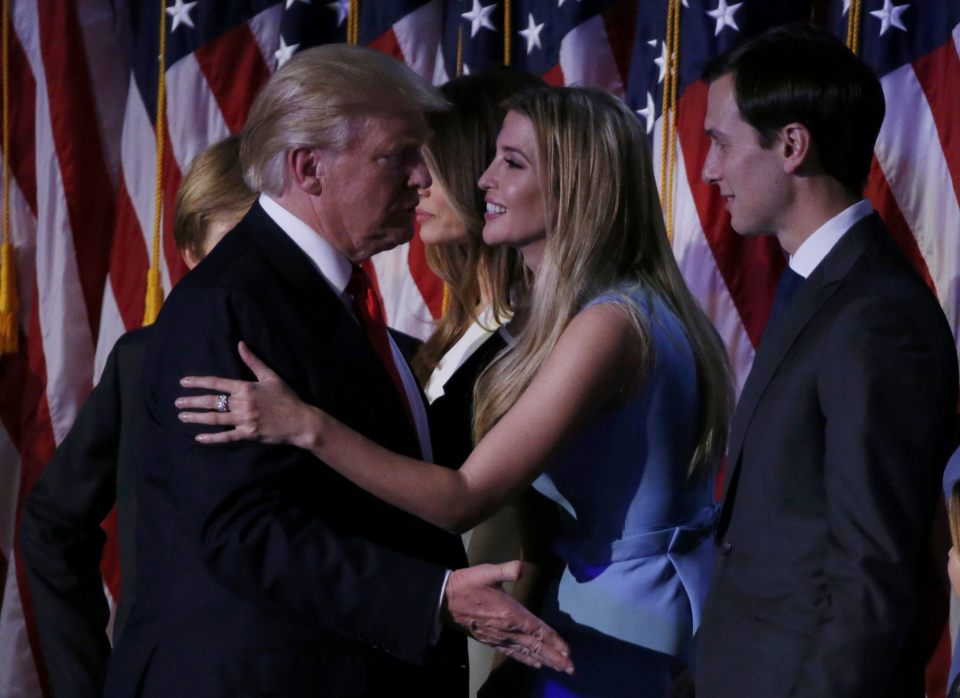  Trump's daughter Ivanka is seen helping the new US President celebrate