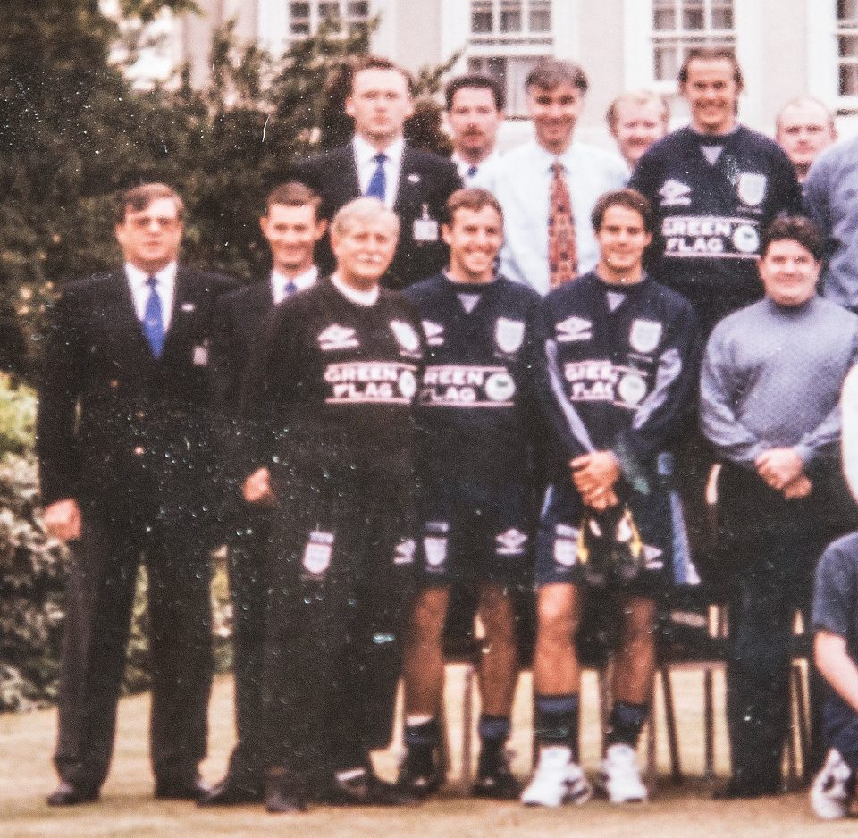 The England team pose outside the hotel