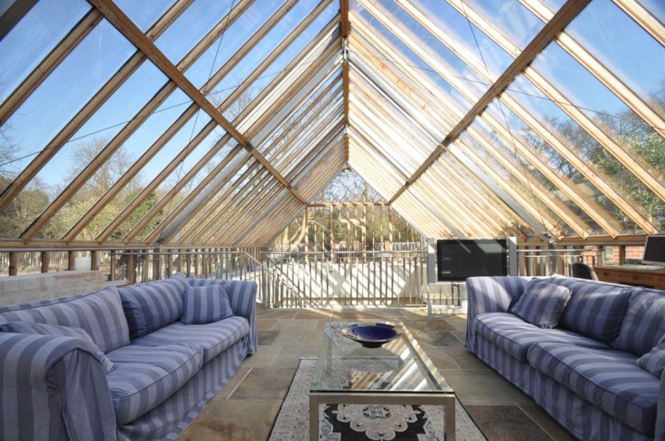  The mansion now has an atrium-style glass roof above the pool area