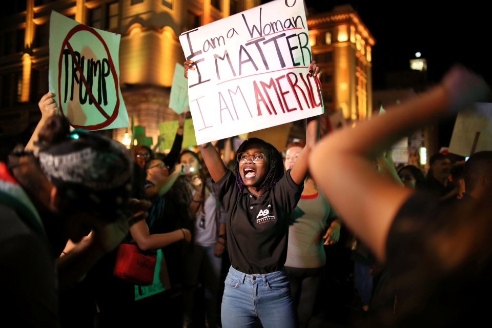  A protester states: 'I am a woman, I matter, I am American'