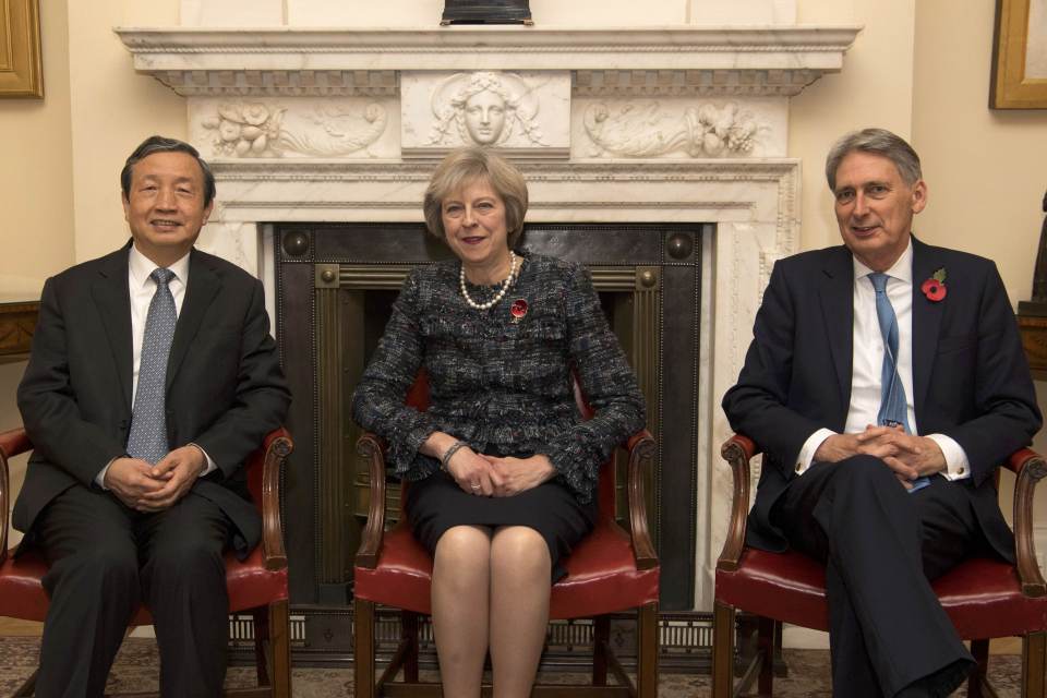  Theresa May and Mr Hammond, greet China's Vice Premier, Ma Kai as he arrives in Downing Street