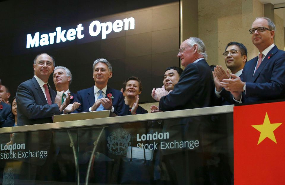  Philip Hammond with, Bank of China chairman Tian Guoli, and London Stock Exchange Group CEO Xavier Rolet open the markets for business today