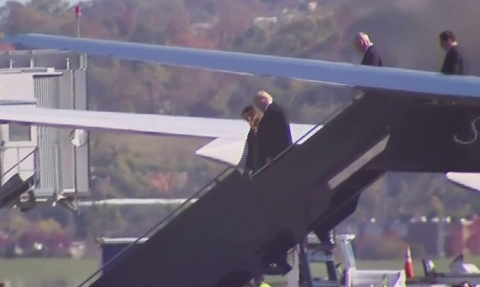  Donald Trump leaves his private jet as he makes his way to the White House