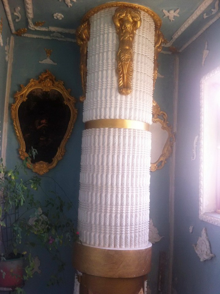 Vladimir is most proud of his transformation of the rubbish chute into a gilded column 