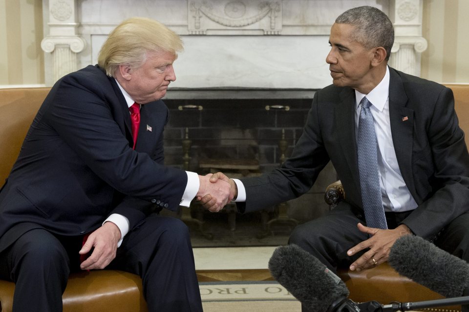  President Barack Obama shakes hands with President-elect Donald Trump at the end of their meeting in the Oval Office of the White House