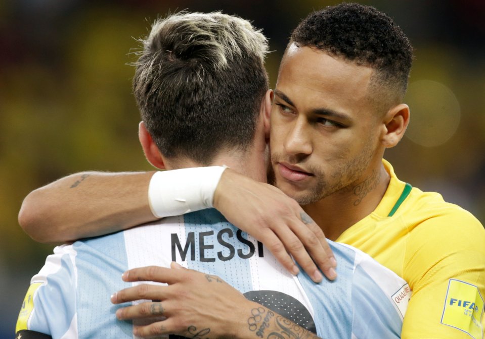  Barcelona team-mates Neymar and Messi embrace after lining up against each other