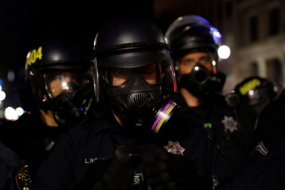  Oakland cops in gas masks