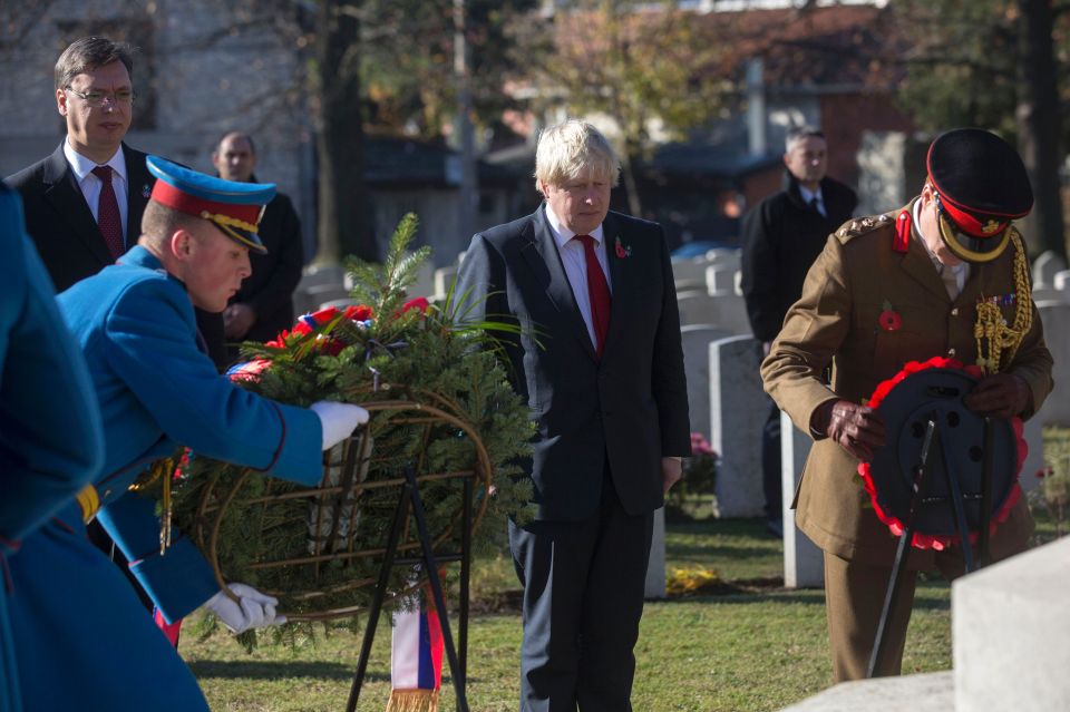  Foreign Minister Boris Johnson is joined by Serbia's Prime Minister Aleksandar Vucic at the Commonwealth military cemetery in Belgrade