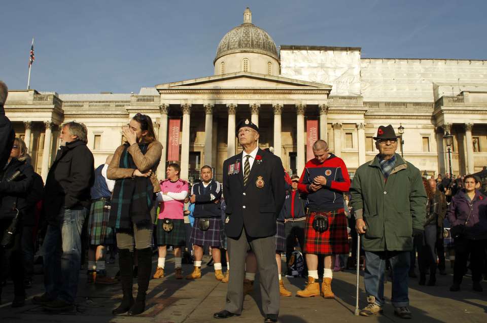  Veterans and members of the public mark the two minutes silence in London's Trafalgar Square