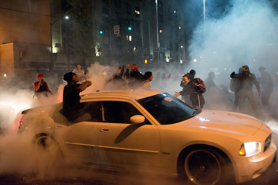  Demonstrators perform burnouts during one of a series of protests in Portland, as disillusioned Hillary Clinton voters take to the streets to voice their fury