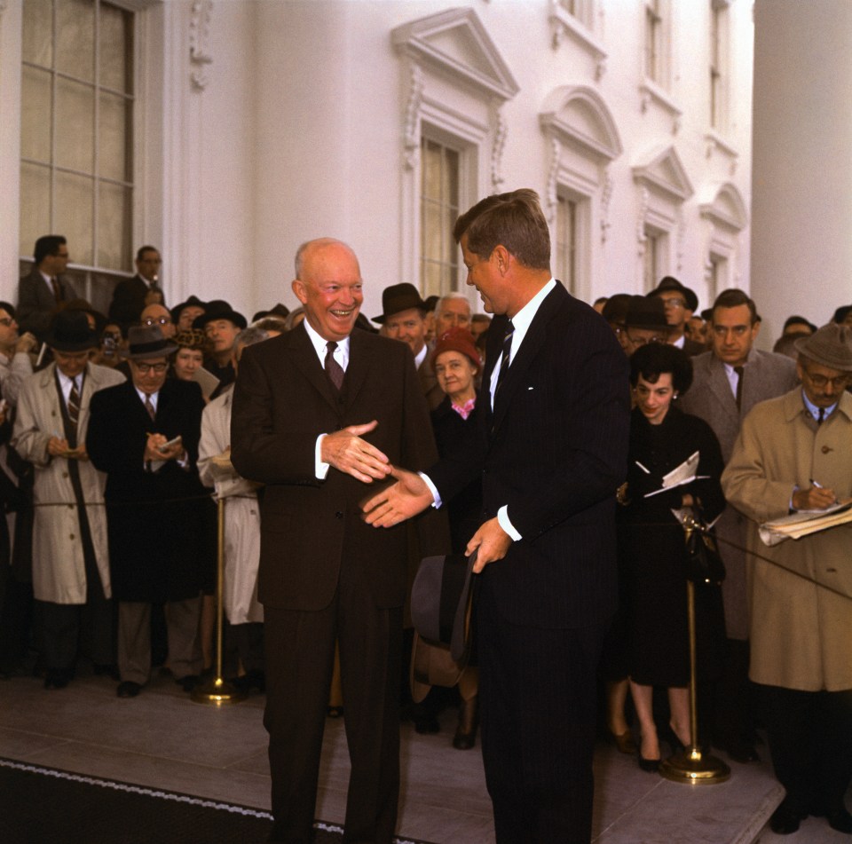  John F Kennedy is welcomed by President Eisenhower in the traditional welcome photo