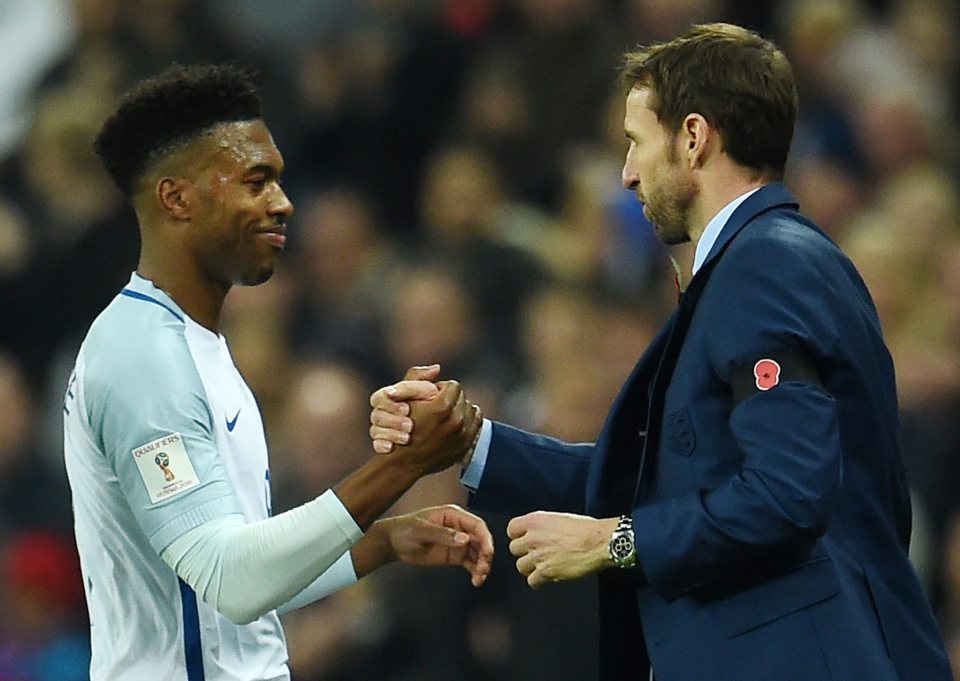 Southgate congratulates Daniel Sturridge during win over Scotland