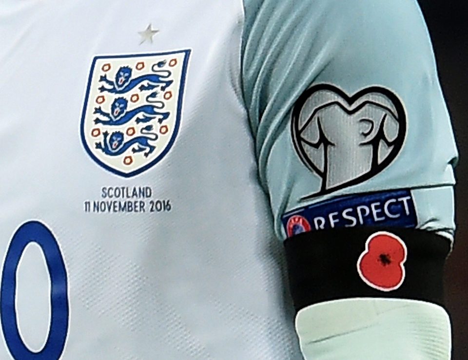 England players wore a ppopy emblem on black armbands