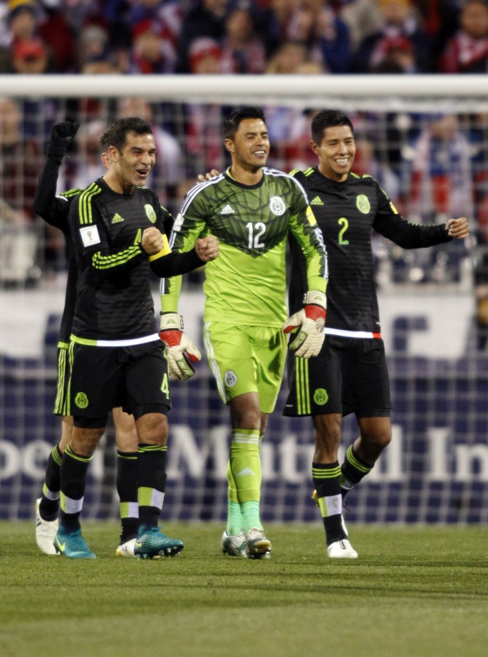  Rafael Marquez (L), celebrates Alfredo Talavera and Hugo Ayala