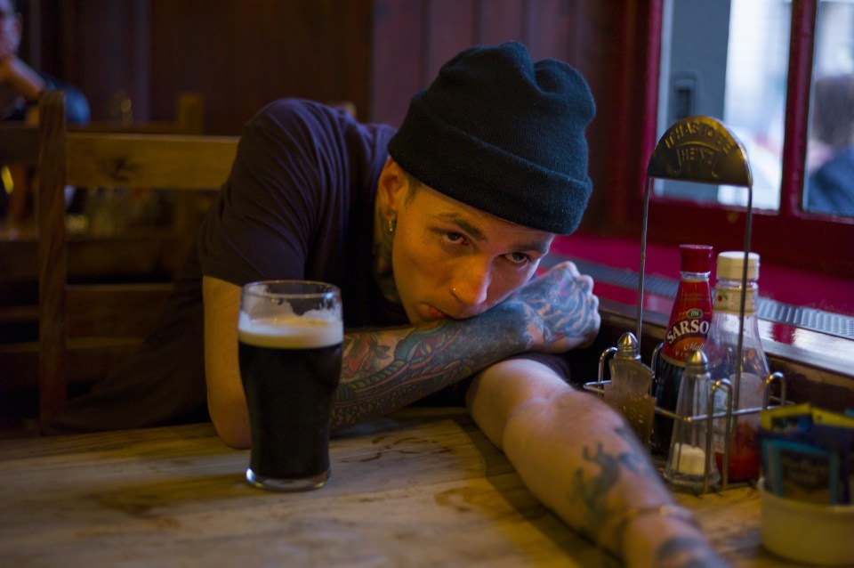 Man having a pint in the pub