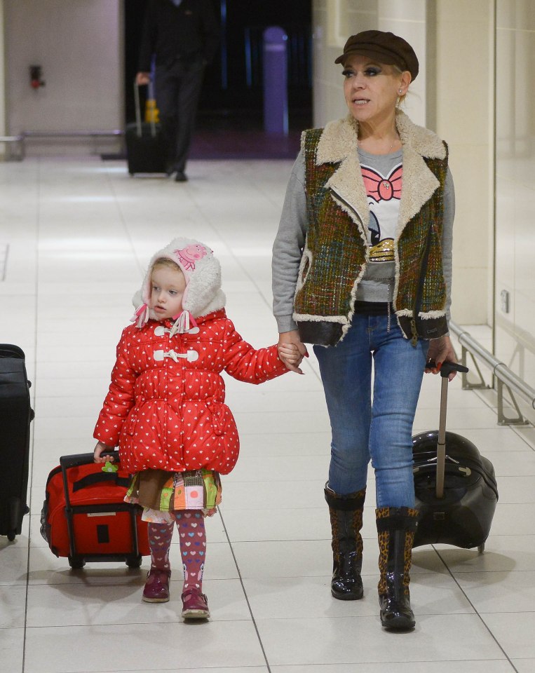  Mother and daughter were pictured making their way through Manchester Airport