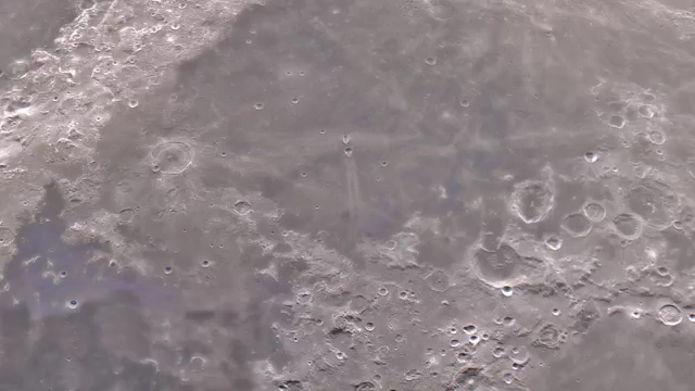  Moon's cratered surface is clearly visible