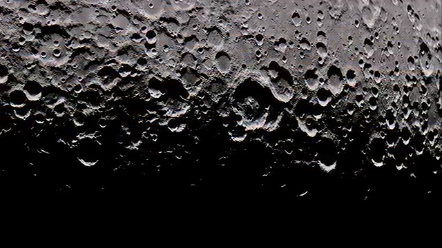  Astounding video shows the cusp of the dark side of the moon