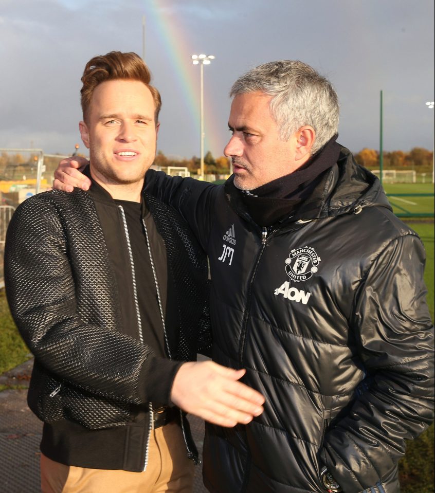 A rainbow shone in the background as Mour greeted Murs