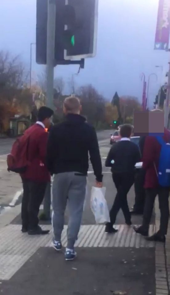  Carrying a chippy bag, Waghorn rushes over to confront the cheeky schoolboy