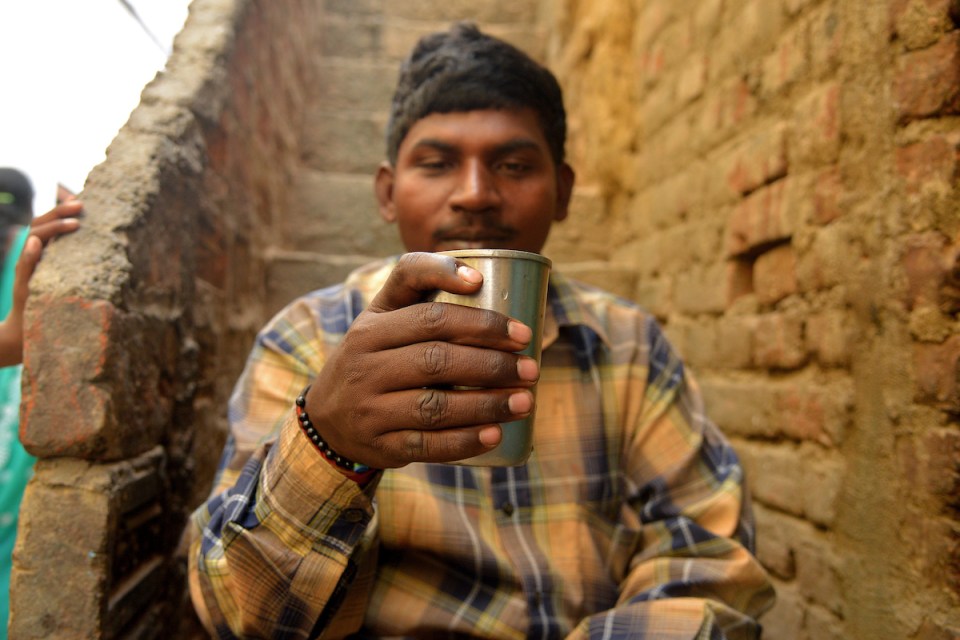  A close-up of Krishna holding a cup