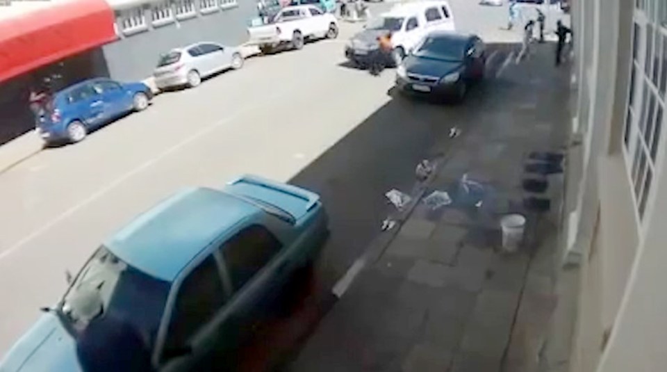  The pedestrian was knocked down by a black and white pick-up truck as she crossed a road in Johannesburg, South Africa