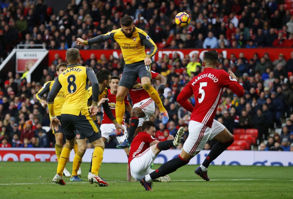 Olivier Giroud netted a last-gasp equaliser to salvage a point for Arsenal