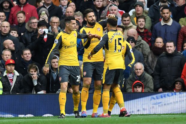 Arsenal celebrate super-sub Olivier Giroud's late equaliser at Old Trafford