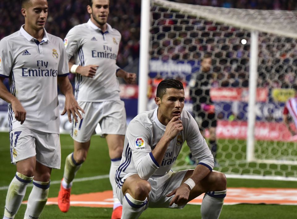 Ronaldo celebrates after scoring his second of the night as he bagged a derby hat-trick