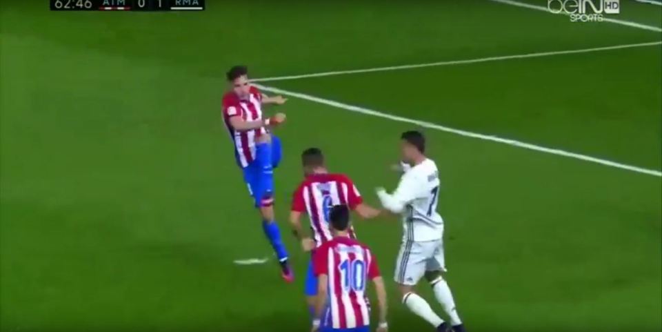 Ronaldo clashes with Koke in the box 