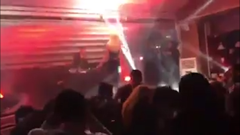  The person filming the musician drops the camera when the explosions went off