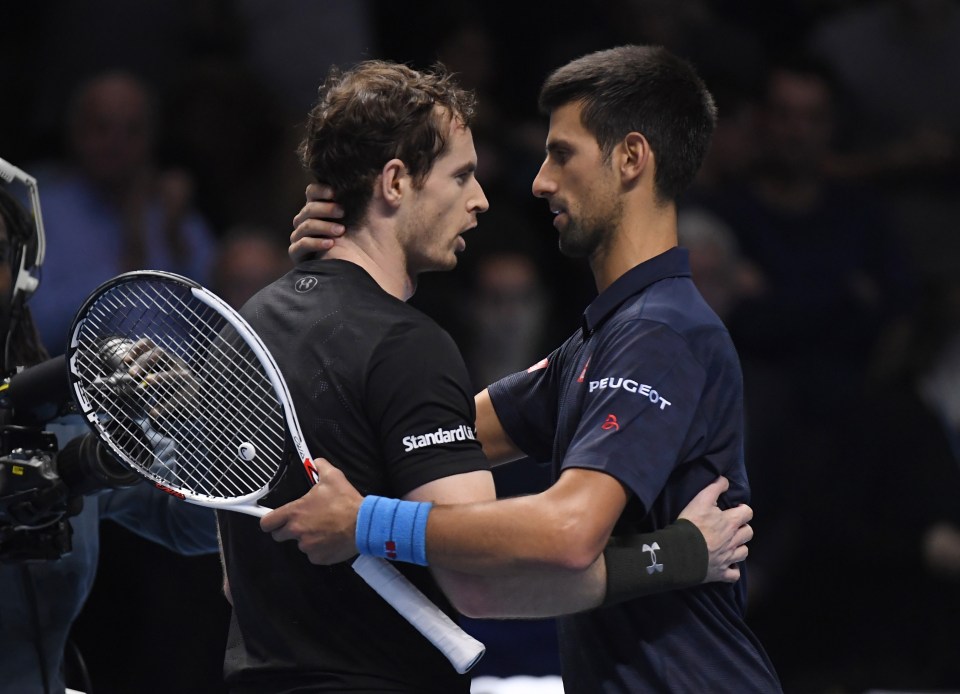 The two players embrace on court after Murray defeated his great rival Djokovic