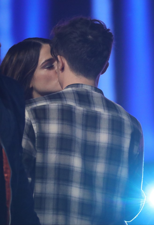  Emily planted a kiss on Ryan after his loss